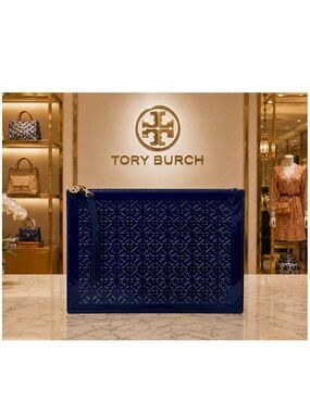 Tory Burch Limited Edition Leather Perforated Laser-Cut Wristlet.